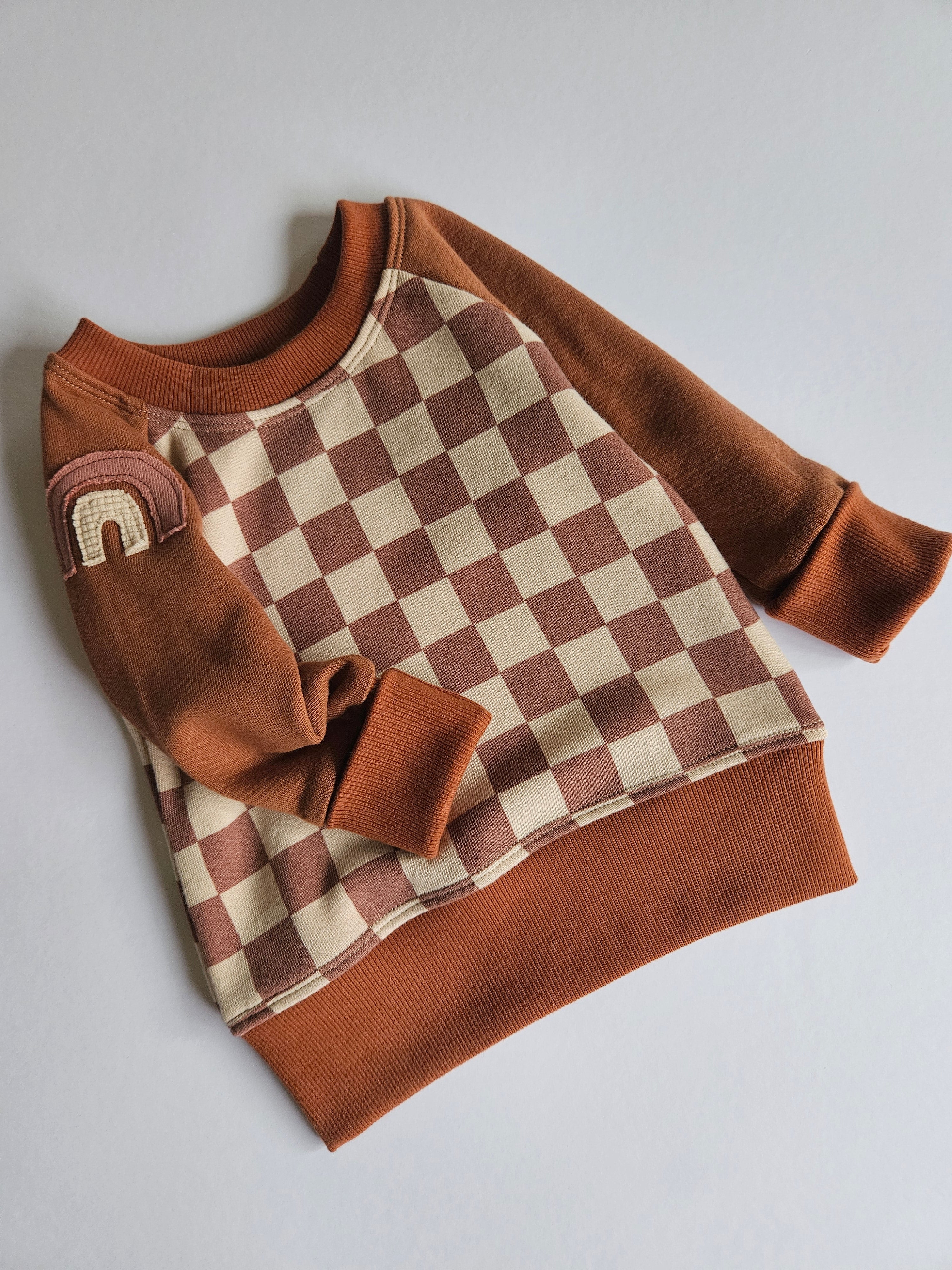 3-12 Months Rainbow Checks Grow With Me Sweater